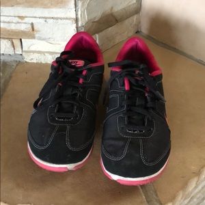 Pink and black nike shoes
